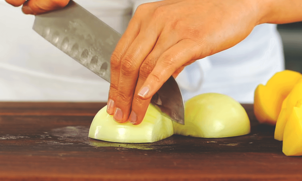 cutting onion for whole chicken roasted
